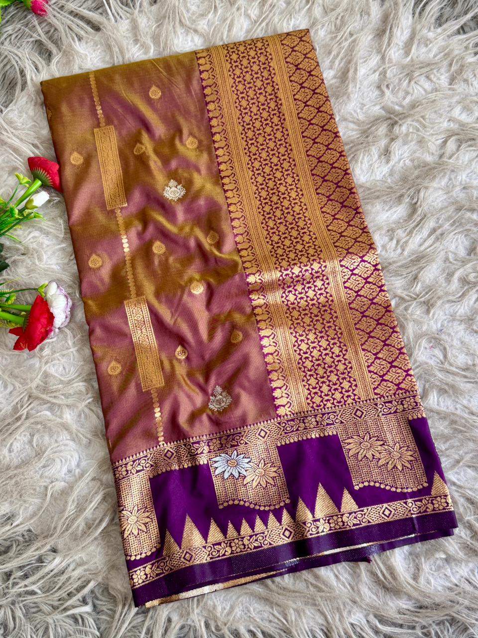 Dusty muvua burgandy premium soft silk saree with warm antique gold sheen of triangular temple style motifs with blouse