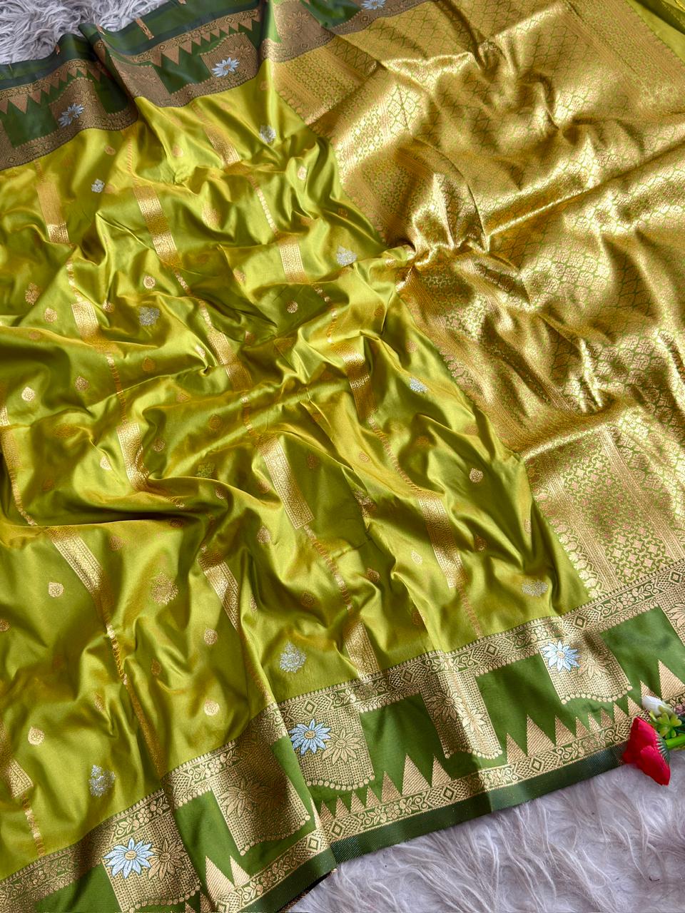 Premium silk parrot green saree and evergreen border of triangular temple style design with blouse