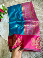 Peacock blue soft silk saree with rani pink border of mango design golden zari with blouse