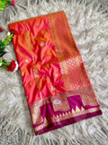 Coral orange premium soft silk saree of berry magenta triangular temple style motifs beneath the floral panels with blouse
