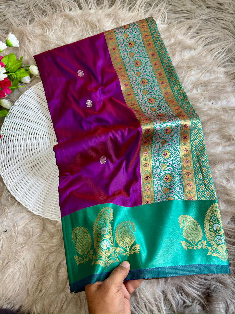 Deep plum purple soft silk saree with vibrant peacock green border of mango design antique gold jareee with blouse