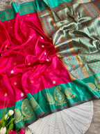 Classic red soft silk saree with aqua green border of Mango design antique gold zari with blouse